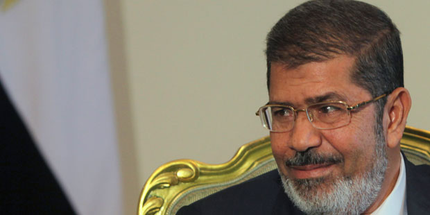 Morsi to attend trial in soundproof booth: security sources