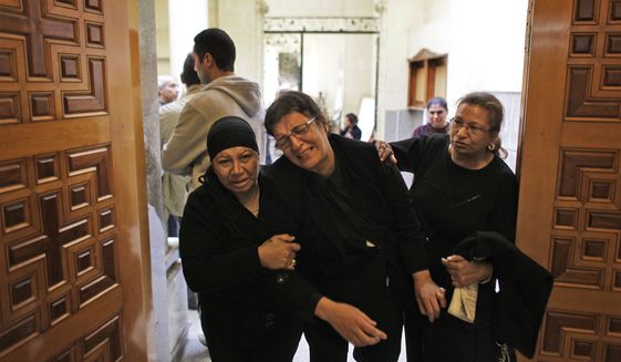 Cairo-area Coptic Christian church left vulnerable as guards gunned down