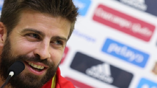 Proud Pique to carry on for Spain despite Catalonia backing