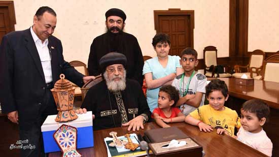 Pope Tawadros receives a group of children who are being treated of cancer