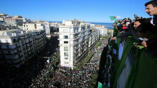 After weeks of protests, Algeria PM starts talks on new government