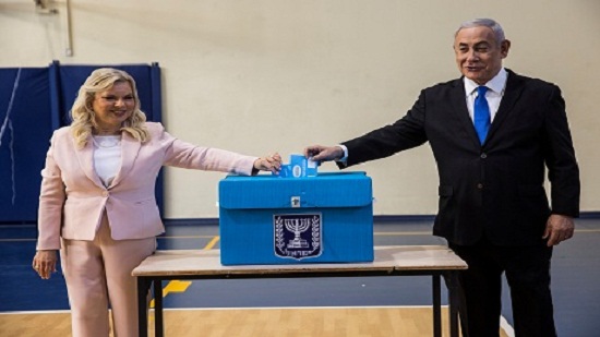 The Latest on Israeli election: Arab leader Ayman Odeh urges high turnout in Israeli vote