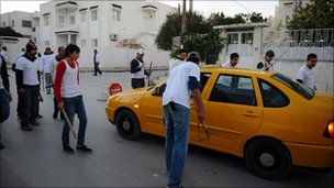 Tunisia seeks to form unity cabinet after Ben Ali fall
