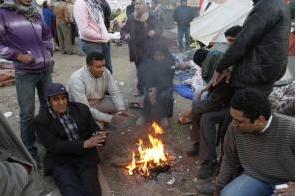 Curfew eased; Egyptian protesters defiant 
