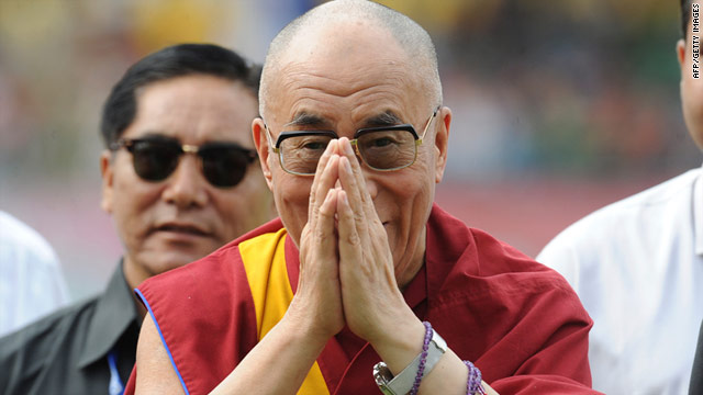 Dalai Lama gives up political role, remains Tibetan spiritual leader
