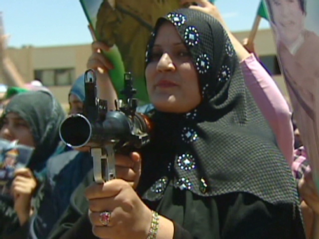 Libya's Gadhafi calls for volunteers, women answer
