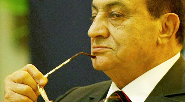Lawyer says Mubarak in a coma, state TV denies	