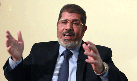 Brotherhood's Mursi rules out presidential runoff vote delay