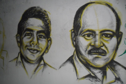 Artists draw pictures of Maspero martyrs in the streets