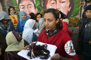 Women cut their hair in protest of new constitution