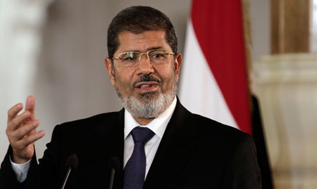 Morsi refuses armyroad map, says he remains Egypt president