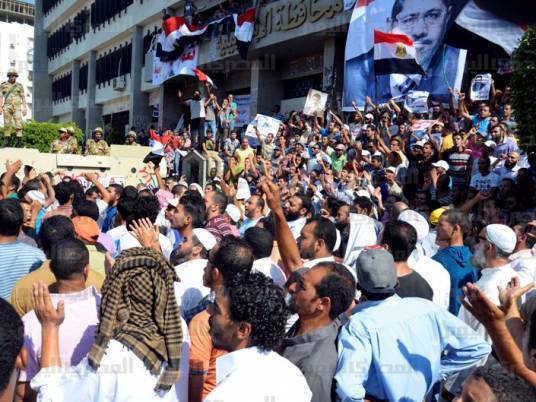Brotherhood vows continued protests until revolution restored