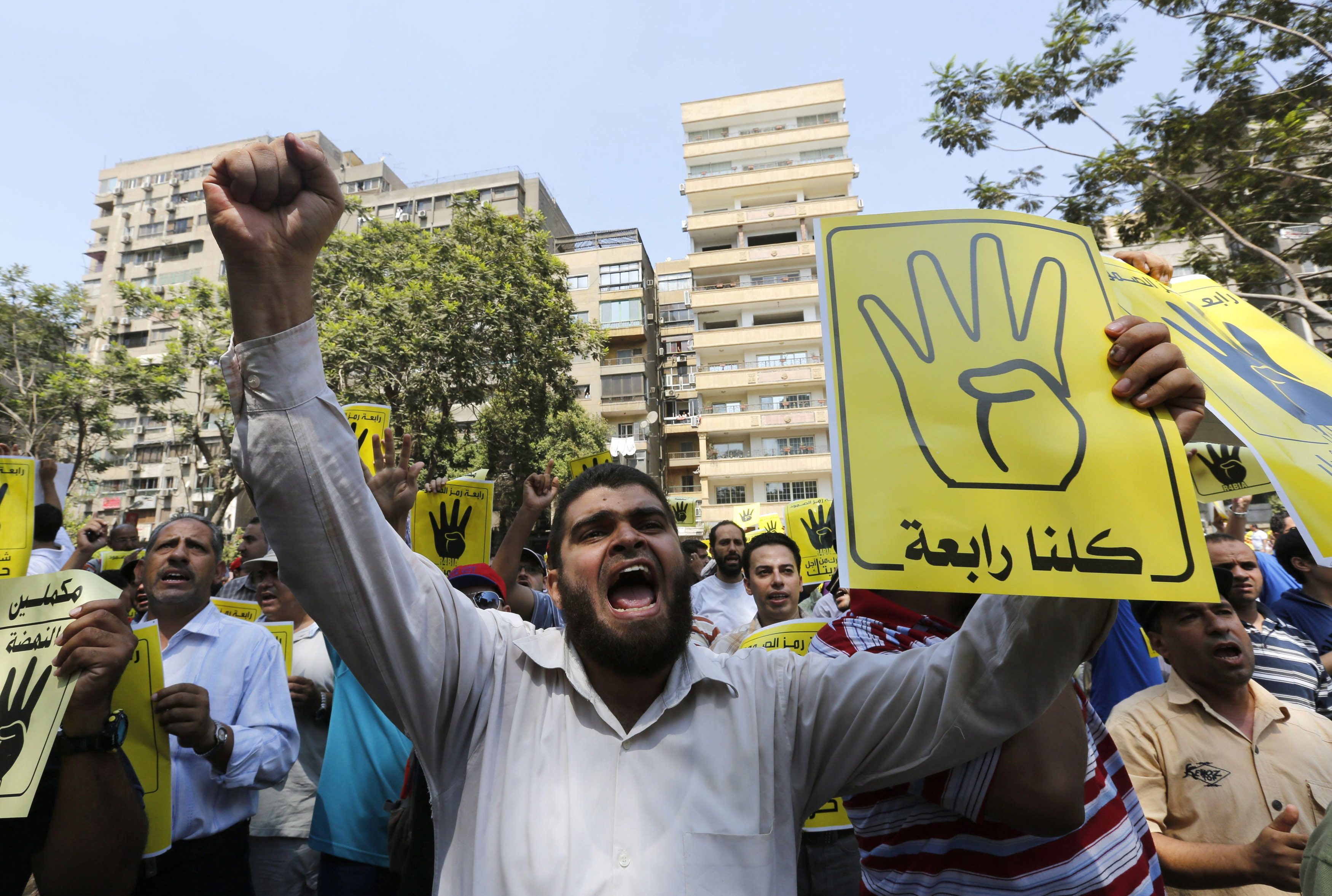 Egypt's Brotherhood under legal threat as bomb hits central Cairo