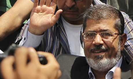 Amnesty calls on Egypt authorities to ensure Morsi appears in court