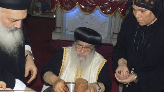 Abba Pachomius perfumes the remains of St. Maurice in Damanhour