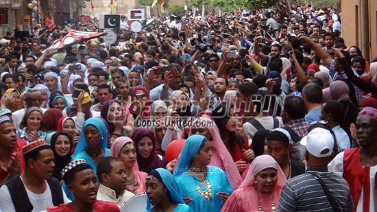 Thousands of Egyptians celebrate International Drums Festival at Al-Mu izz Street