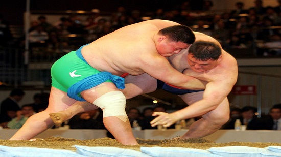 North, South Korea join hands to get wrestling on UN culture list