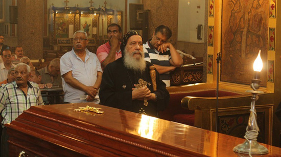 Bishop of Qena leads the funeral prayer for his brother