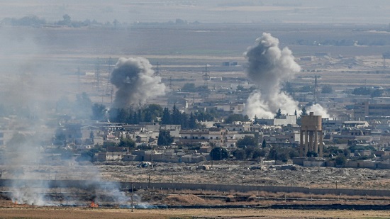 Syria Kurds defend key town as Turkey ignores US
