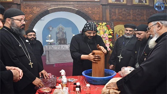 Bishop Illarion perfumes the remains of Saints Mina and Moses

