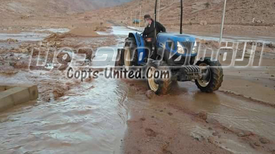 Monks of St. Catherine s Monastery participate in removing the effects of torrents 
