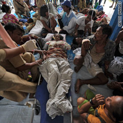 Aid trickles into Indonesia quake and tsunami zone

