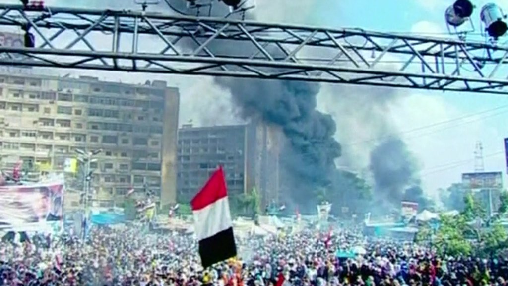 Morsy supporters, Egypt security forces clash in deadly protest camp raids