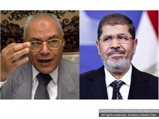 Morsy hires defense lawyer after visit: source