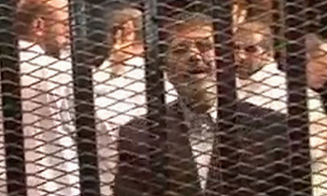 Delegation urges Morsi to appoint defence lawyer